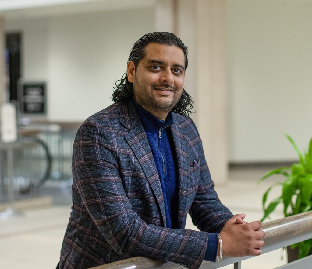 Dilpreet, commercial realtor in a mall in winnipeg